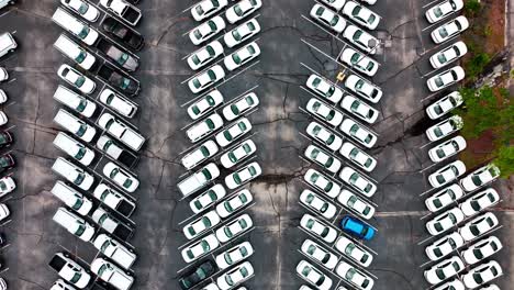 Unmarked-Police-cars-parking-lot-aerial-shot-straight-down-trucking-left