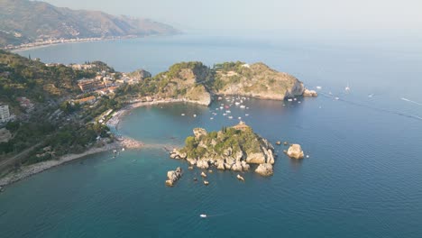 Beautiful-Aerial-View-Above-Isola-Bella---Sicilian-Tourist-Destination