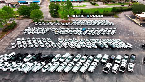 Flying-over-a-huge-parking-lot-full-of-undercover-unmarked-police-cars