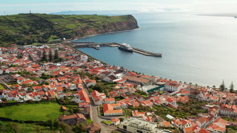 Aerial-drone-shot-or-Horta-town-at-the-seaside-in-Faial-island,-Azores---Portugal