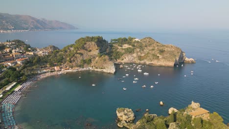 Aerial-Pullback-Reveals-Beautiful-Isola-Bella,-Sicily,-Italy