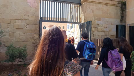 Tourists-approach-the-Valletta-city-gate-on-the-island-of-Malta