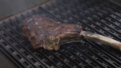 Grilling-steak-on-outside-BBQ-kitchen