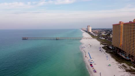 Aerial-view-during-morning-dawn,-clear-water-beach-of-Panhandle-Florida-America