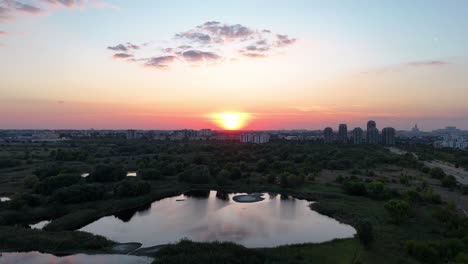 Drone-View-Over-Vacaresti-Delta-At-Sunset,-Cityscape,-Bucharest,-Romania