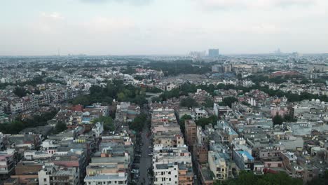 4K-Aerial-Shots-of-New-Delhi-Residential-Suburbs-on-a-beautiful-day-gliding-over-Rooftops,-streets,-parks-and-markets-in-India