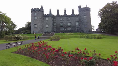 Kilkenny-City-people-walking-in-the-Rose-Garden-at-Kilkenny-Castle-on-a-warm-day