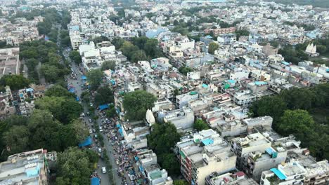 4K-Aerial-Shots-of-New-Delhi-Residential-Suburbs-on-a-beautiful-day-gliding-over-Rooftops,-streets,-parks-and-markets-in-India