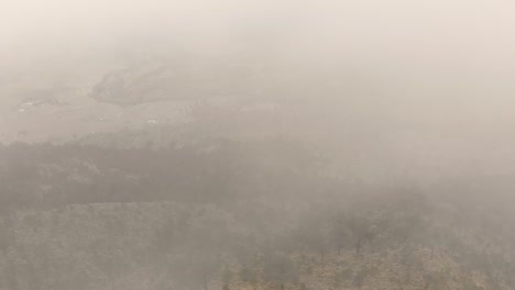 Misty-Mexican-Landscape-with-Aerial-View-of-El-Ajusco-Hilltop-Through-Low-lying-Fog