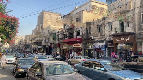 Streets-of-Amman-in-Jordan-during-the-day-with-cars-and-people-around-4K
