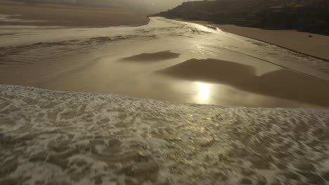 Ocean-to-Beach-Golden-Light-in-Portugal-Drone-Footage,-Foz-do-Lizandro