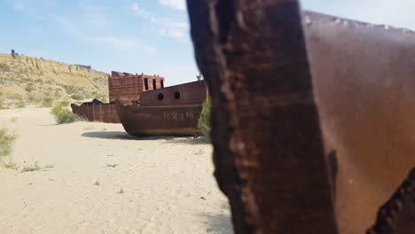 Rusty-Corroded-Ships-in-Sand,-Apocalyptic-Scenery-From-Former-Aral-Sea,-Central-Asia