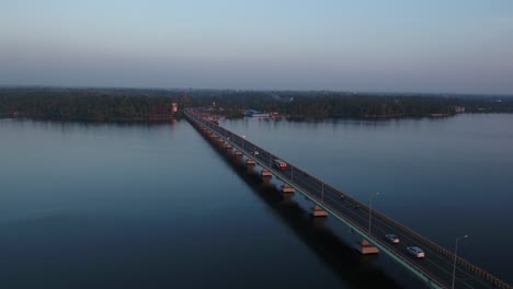 Bridge-on-River-Highway-Road-Big-City-Traffic-Aerial-View