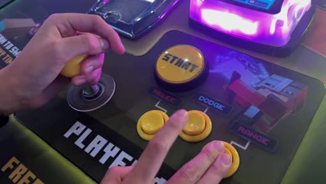 Arcade-Video-Game,-Hands-Using-Joystick-and-Buttons-To-Battle-Minecraft-Characters