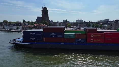 Container-vessel-travelling-on-the-Oude-Maas-river