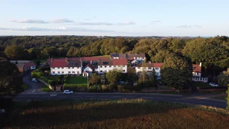Houses-in-Castle-Eden-Village-in-County-Durham-during-low-sun-golden-hour---Aerial-Drone-4K-HD