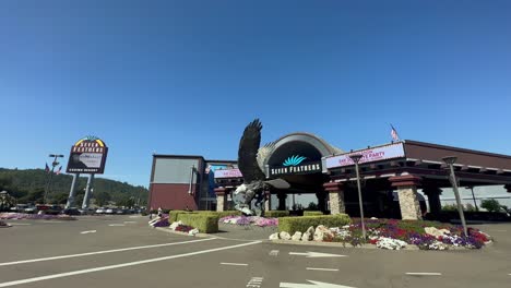 Roundabout-of-the-Seven-Feathers-Casino-with-an-eagle-statue-and-American-flag