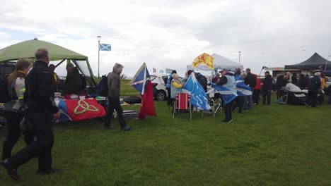 A-dark-and-windy-day-for-the-stalls-at-the-March-of-Independence-in-Ayr,-Scotland
