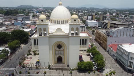 Aerial-orbits-large-white-dome-atop-Metro-Cathedral-in-San-Salvador
