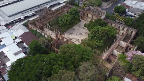 Aerial-orbits-roofless-historic-building-ruin-in-Santa-Ana-El-Salvador