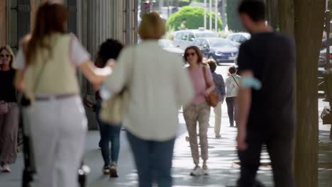 A-telephoto-shot-of-pedestrians-on-busy-street-in-European-city