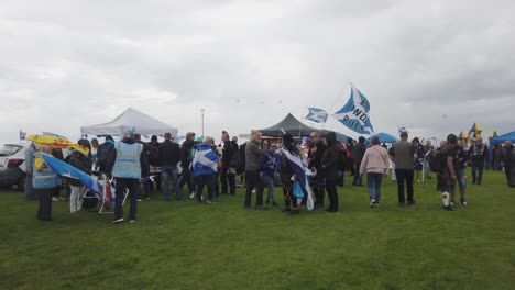 Wide-shot-of-protesters-going-to-the-stalls-after-the-Pro-Scottish-Independence-march-in-Ayr