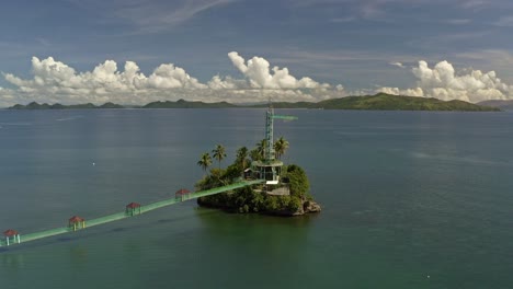 Point-of-view-drone-shot-of-Bacuag-Hanging-Bridge-and-Octopus-Islet
