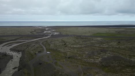 Driving-around-Iceland-through-the-south-coast,-next-to-the-ocean