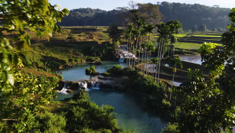 Revealed-Exotic-Weekacura-Waterfalls-Near-Terraced-Rice-Fields-In-West-Sumba,-Indonesia