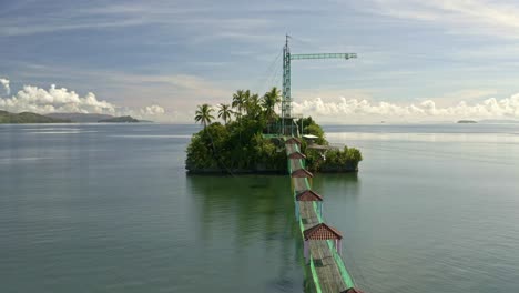 Fly-past-drone-shot-of-Bacuag-Hanging-Bridge-and-Octopus-Islet