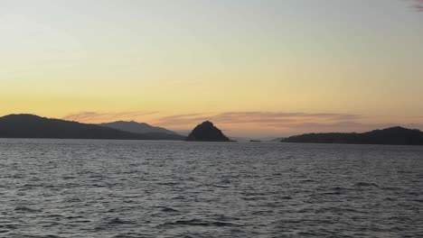 Panoramic-view-of-mountains-and-small-islands-in-the-Gulf-of-Nicoya,-Costa-Rica,-during-the-sunset