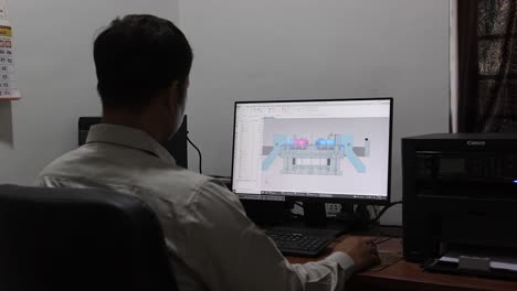 Engineer-creating-in-3d-software-dye-Patton-3D,-computer-screen-scene-in-which-an-engineer-is-creating-a-design
