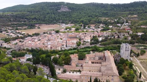 Small-Medieval-Town-in-South-of-France-with-Abbey-|-HD-Aerial