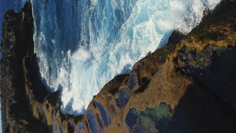 Ocean-waves-crashing-against-cliffs,-natural-pools,-Cap-Des-Pins