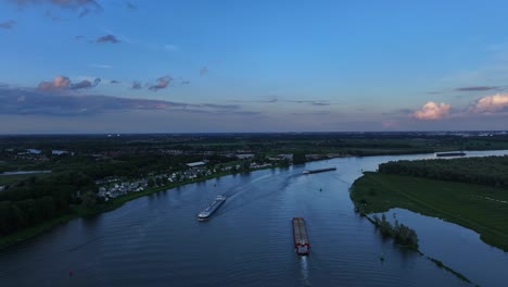 Night-descends-over-Barendrecht-and-cargo-ships-on-the-river-Oude-Maas