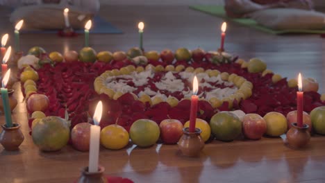Vedic-Tradition-and-Ritual-Offering-of-Decorated-Fruits-Flowers-and-Candles-On-Floor