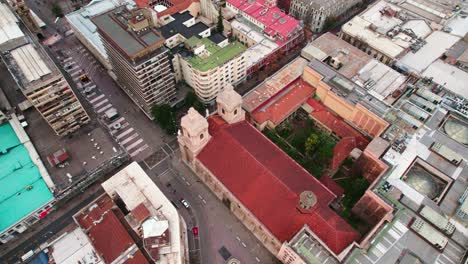 Drone-establishing-shot-of-the-Santo-Domingo-church,-a-Dominican-temple-in-downtown-Santiago,-Chile