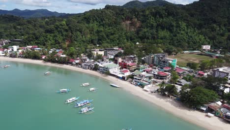 Aerial-view-of-El-Nido-town-proper-and-port-beachfront-in-Bacuit-Bay,-Philippines