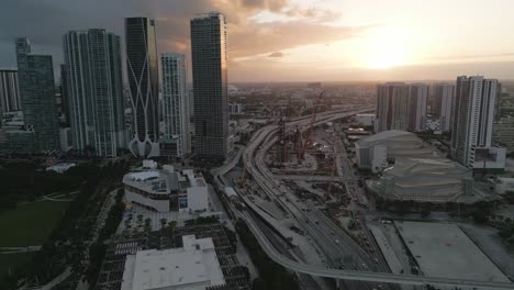 Aerial-Drone-Panoramic-Above-Miami-City-Downtown,-Sunset-Skyline-in-Central-USA-American-Modern-Town,-Florida