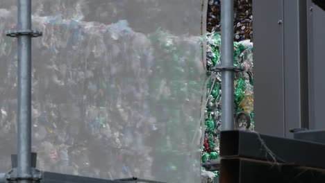 Deposit-of-compressed-bottles-cubes-in-the-recycling-company