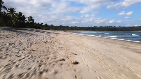 Foot-Marks-Over-White-Sand-Beach-Of-Pantai-Watu-Bella-In-West-Sumba,-East-Nusa-Tenggara,-Indonesia