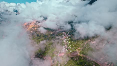 High-altitude-drone-descent-reveals-Cosñirhua-Malata-annex-in-spring-amid-intense-post-rain-clouds