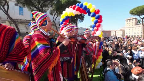 Andean-Peruvian-band-playing-during-a-Latin-American-carnival-in-Rome-with-traditional-dance