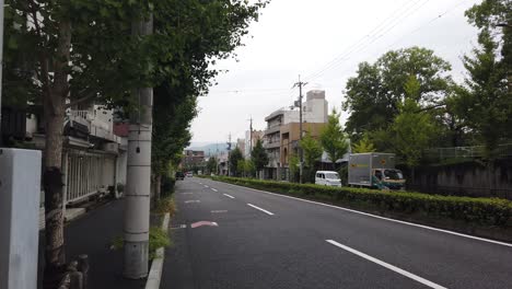 Hand-Held-Shot-of-Empty-Avenue-Streets-of-Kyoto-Japan-during-Summer
