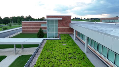 Plants-on-green-roof-of-futuristic-school-in-USA