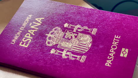 Close-View-of-Spanish-Passport-in-Slow-Motion