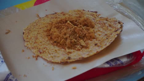 Traditional-food-"Kerak-Telor"-From-Jakarta,-Indonesia,-made-from-rice