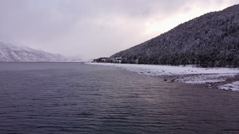 Fjords-of-Norway-beach-covered-with-snow
