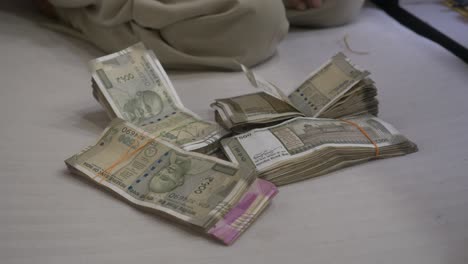 Bundle-of-cash,-Indian-rupee-banknotes,-Indian-Cash