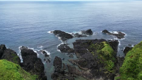 Rocky-Coast-Of-A-Beach-In-Baras,-Catanduanes,-Philippines---aerial-drone-shot